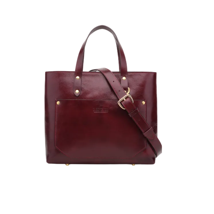 Burgundy handbag with gold accents on a white background