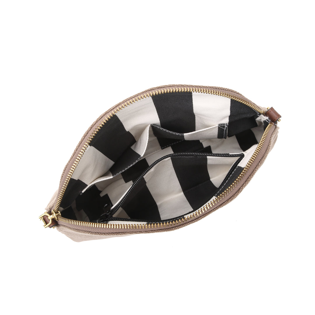 Pouch with black and white striped interior on a white background