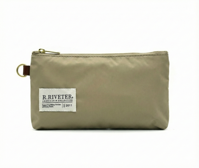 Beige pouch with a label on a white background
