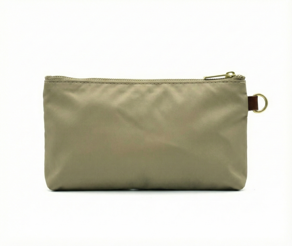 Beige pouch with a gold zipper on a white background