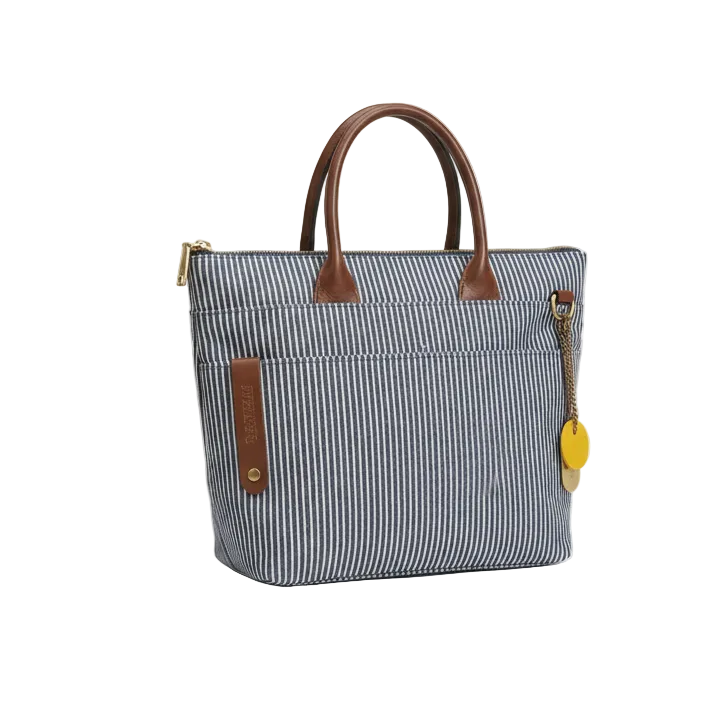Blue striped handbag with brown handles and accents on a white background