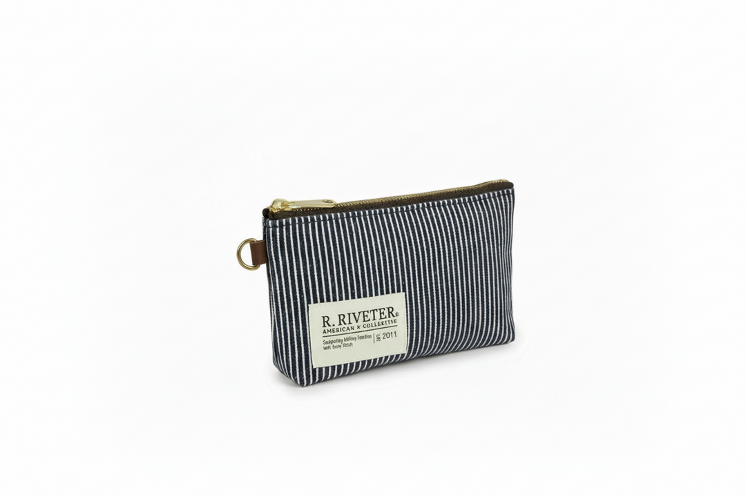 Blue and white striped pouch with 'R. Riveter' label on a white background