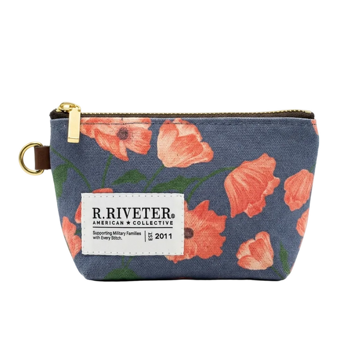 Floral patterned pouch with 'R. Riveter' label on a white background