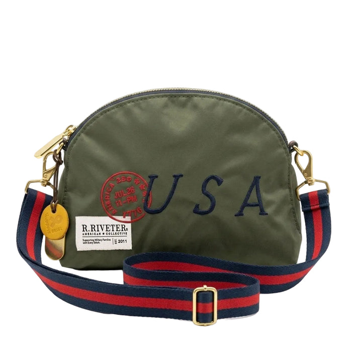 Green crossbody bag with 'USA' embroidery and red and blue strap on a white background
