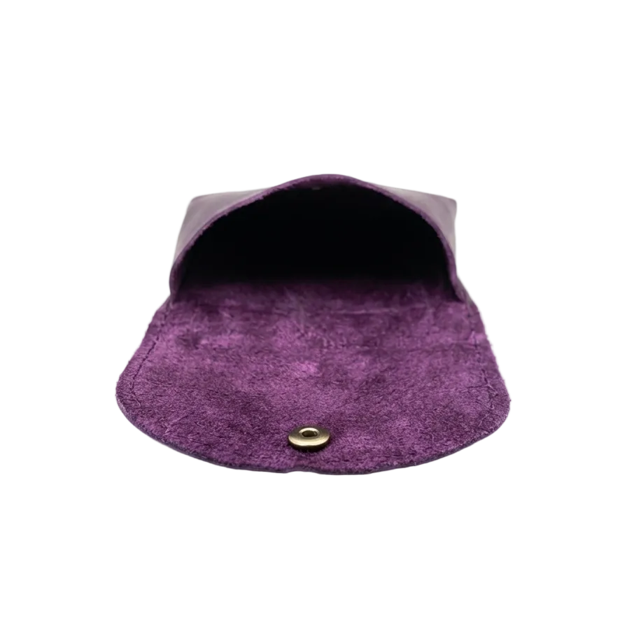 A small purple suede pouch with a snap button closure, shown open against a plain white background.