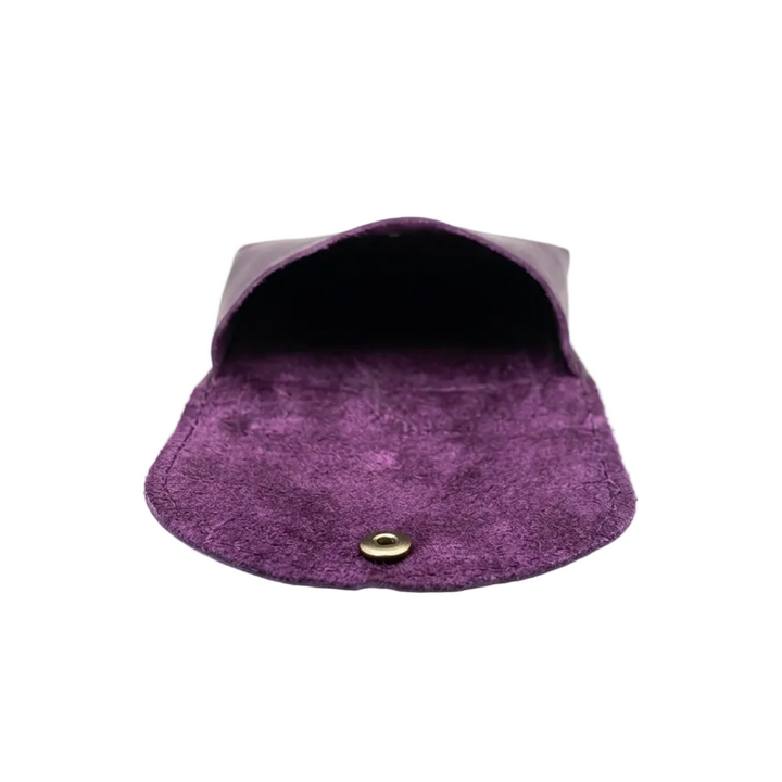 A small purple suede pouch with a snap button closure, shown open against a plain white background.
