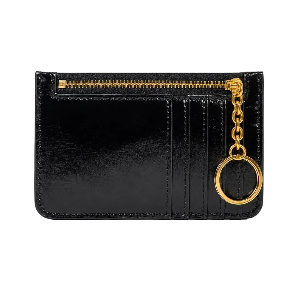 A black patent leather card holder wallet with gold-tone hardware, featuring a top zipper, card slots, and a keychain ring.
