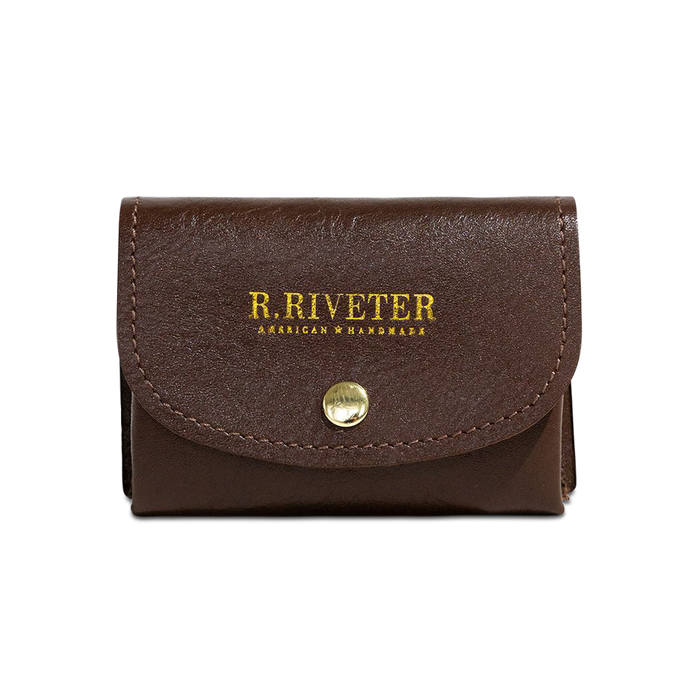 A brown leather wallet with a flap closure featuring gold-embossed 'R. RIVETER' branding and a gold snap button, shown on a plain white background.